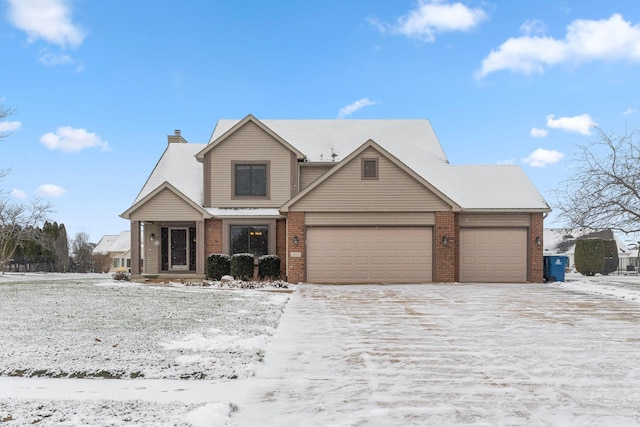 front of property with a garage