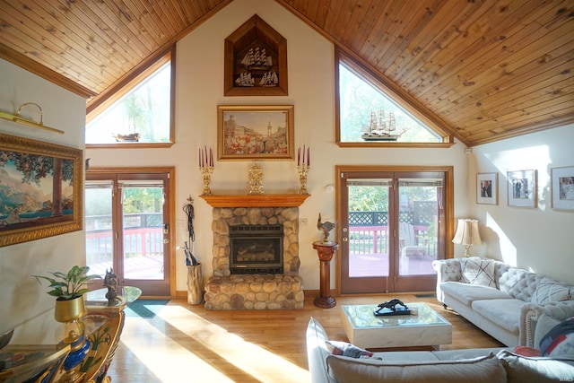 living room with high vaulted ceiling, wooden ceiling, and light wood-type flooring