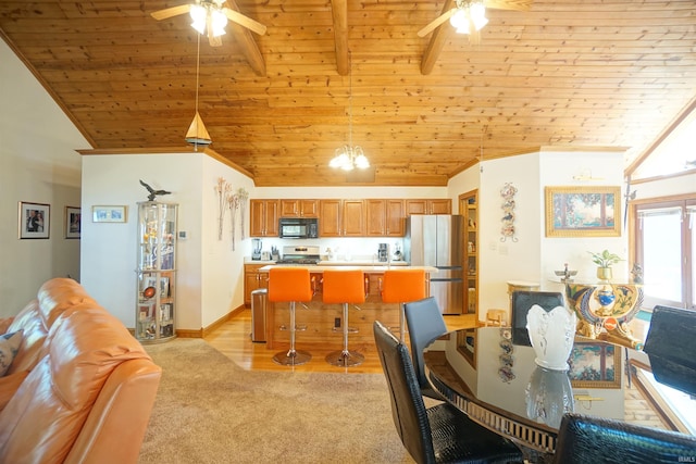 carpeted dining area featuring vaulted ceiling with beams, wood ceiling, and ceiling fan with notable chandelier