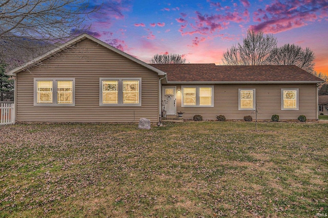 view of front of house with a lawn