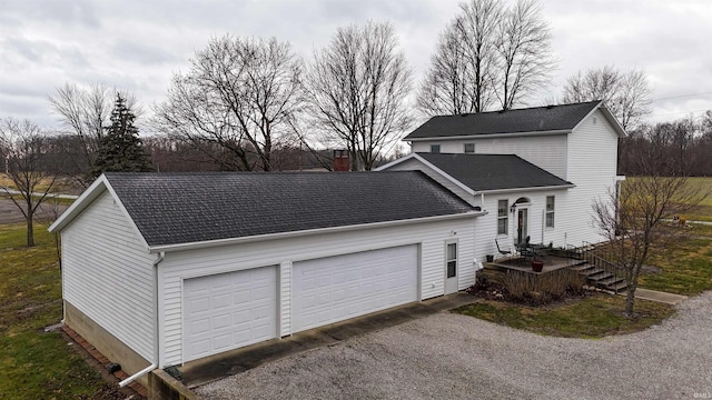 view of property exterior featuring a garage