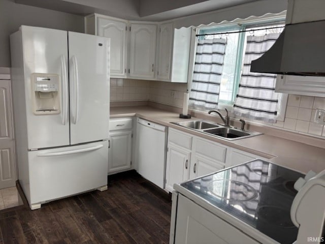 kitchen featuring white appliances, ventilation hood, sink, decorative backsplash, and white cabinetry