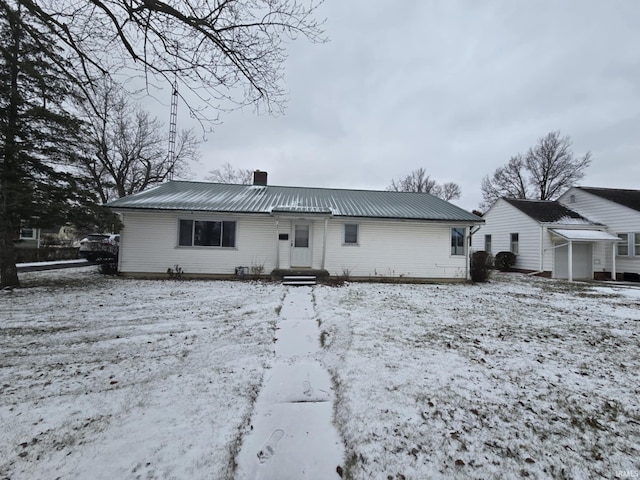 view of snow covered property