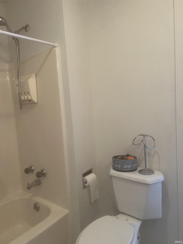 bathroom featuring toilet and shower / washtub combination