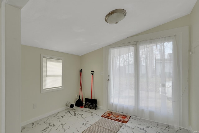 interior space featuring vaulted ceiling