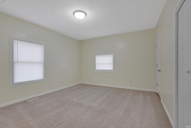 empty room with light carpet