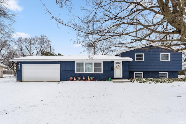 tri-level home featuring a garage