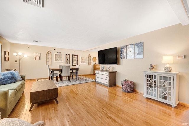 living room with hardwood / wood-style floors