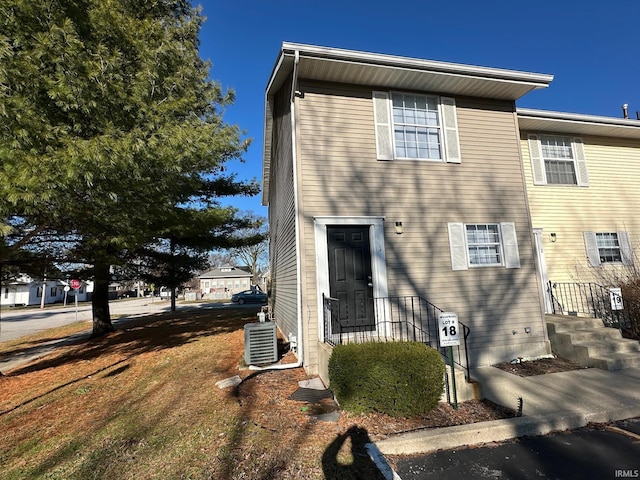 view of front of property featuring central AC unit