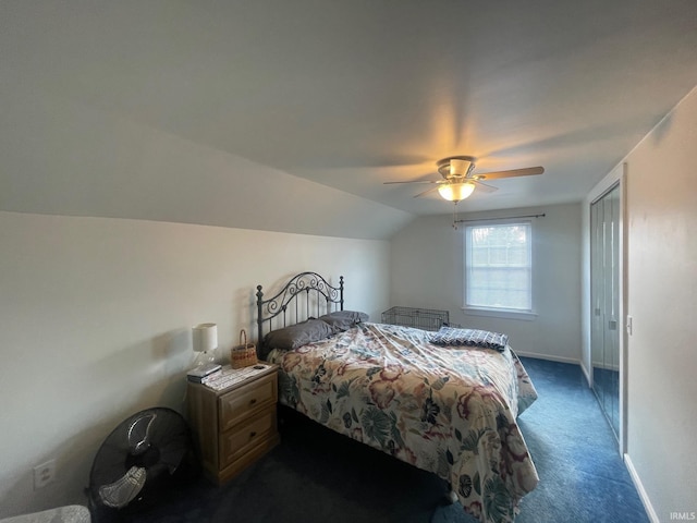 carpeted bedroom featuring vaulted ceiling and ceiling fan