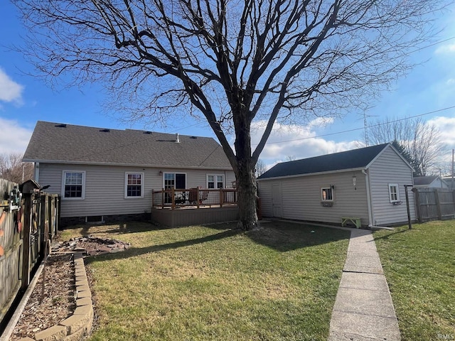 exterior space with a lawn and a wooden deck