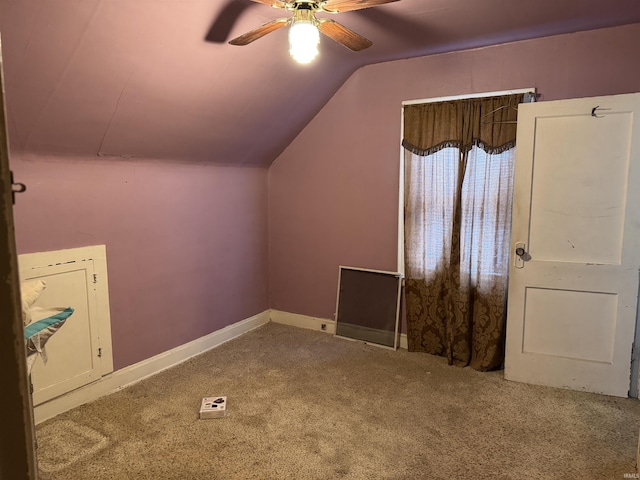 bonus room with carpet flooring, ceiling fan, and lofted ceiling