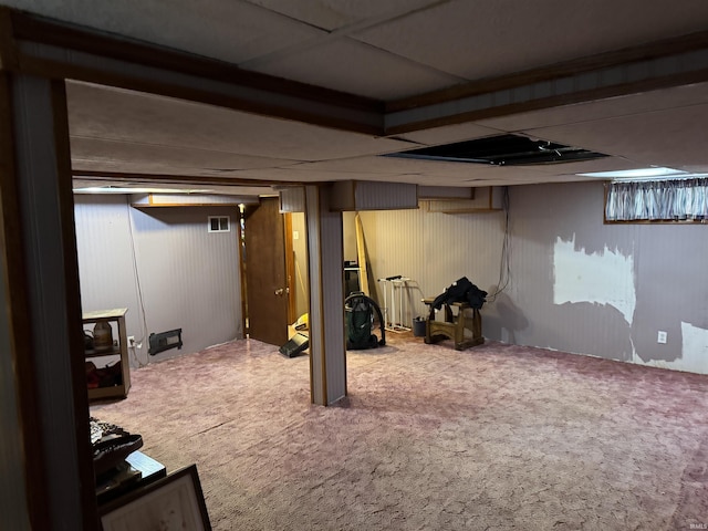 basement with carpet flooring