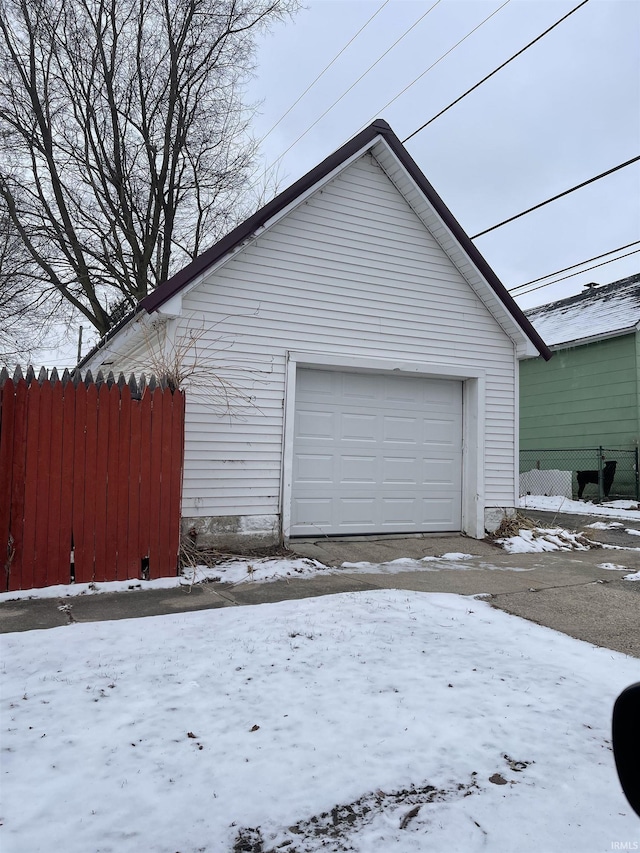 view of snow covered garage