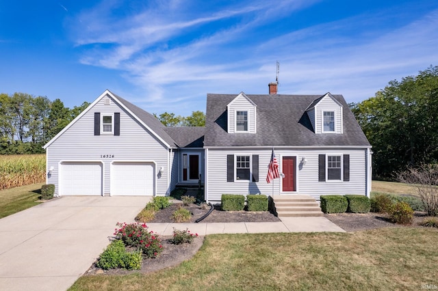 cape cod-style house with a garage and a front yard