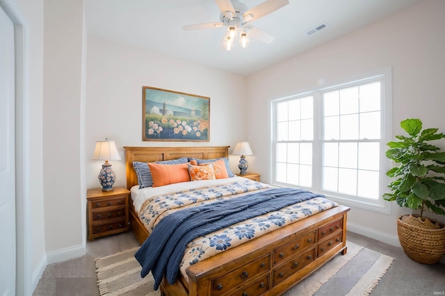 carpeted bedroom featuring ceiling fan