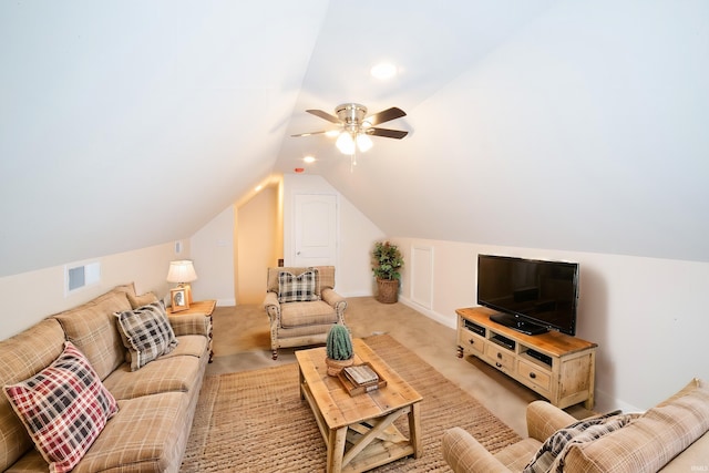 living room with light carpet, vaulted ceiling, and ceiling fan