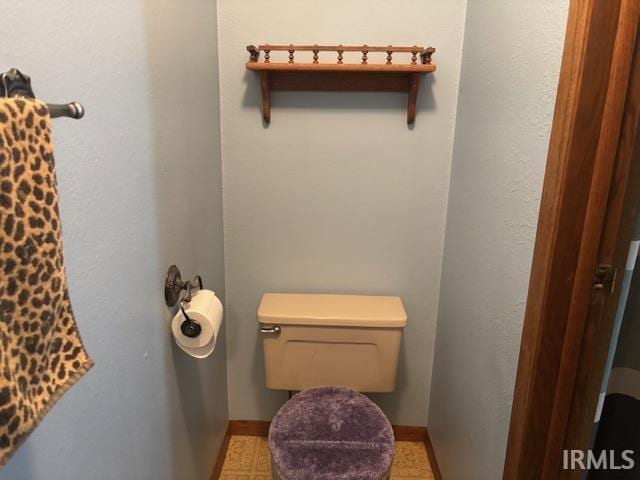 bathroom featuring toilet