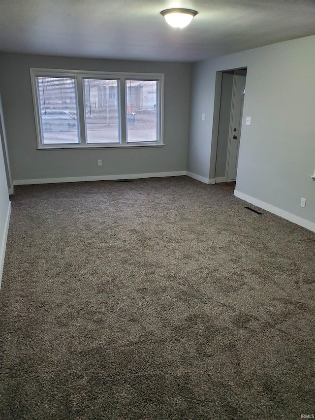 view of carpeted spare room