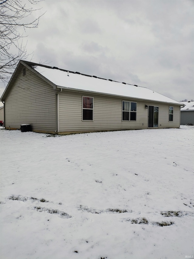 view of snow covered property