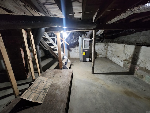 basement featuring heating unit