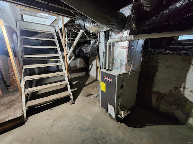 utility room with heating unit