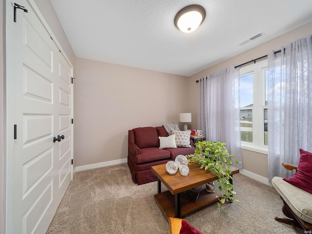 living room with light colored carpet