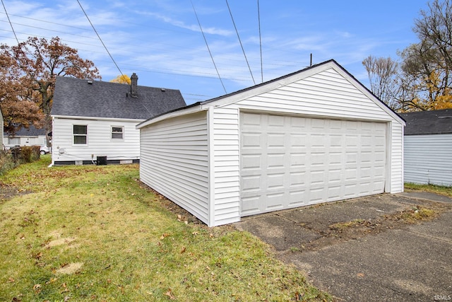 garage with a lawn