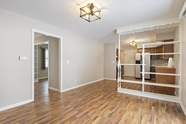 unfurnished room featuring hardwood / wood-style floors