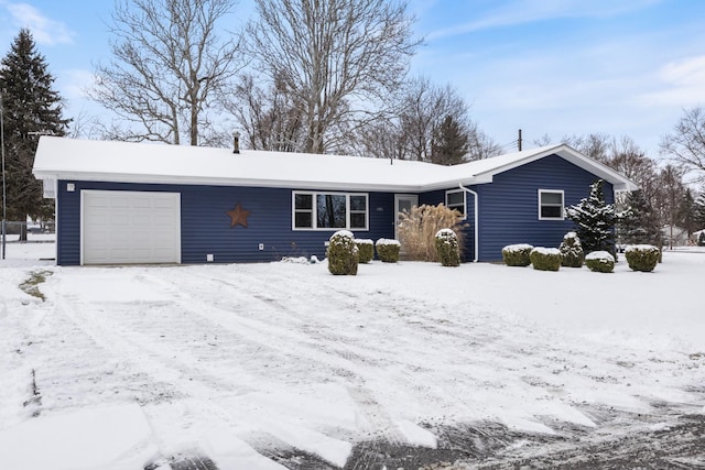 single story home with a garage