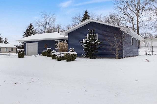 exterior space with a garage