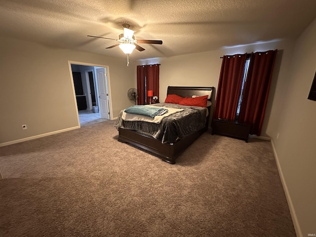 bedroom with carpet, ceiling fan, and a textured ceiling