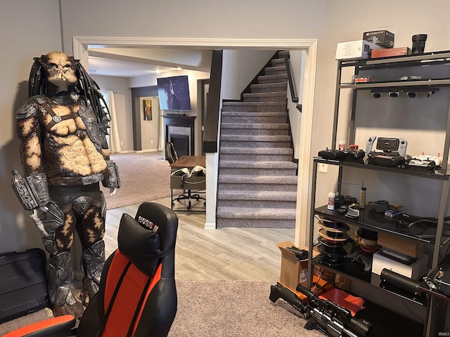 staircase featuring hardwood / wood-style flooring