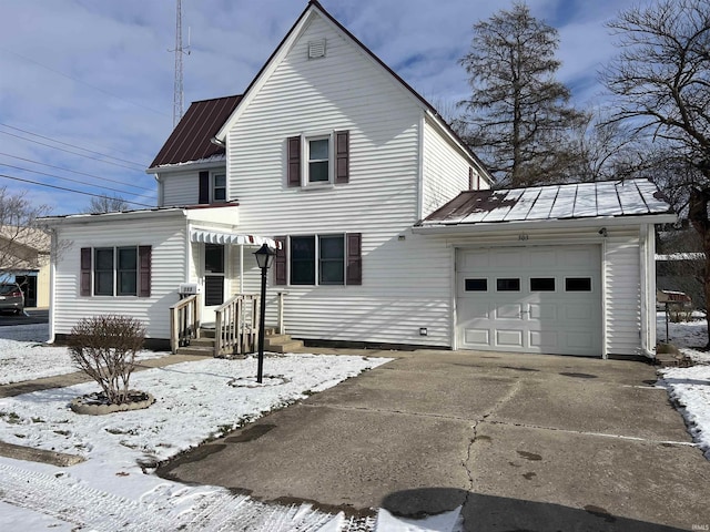 front of property featuring a garage