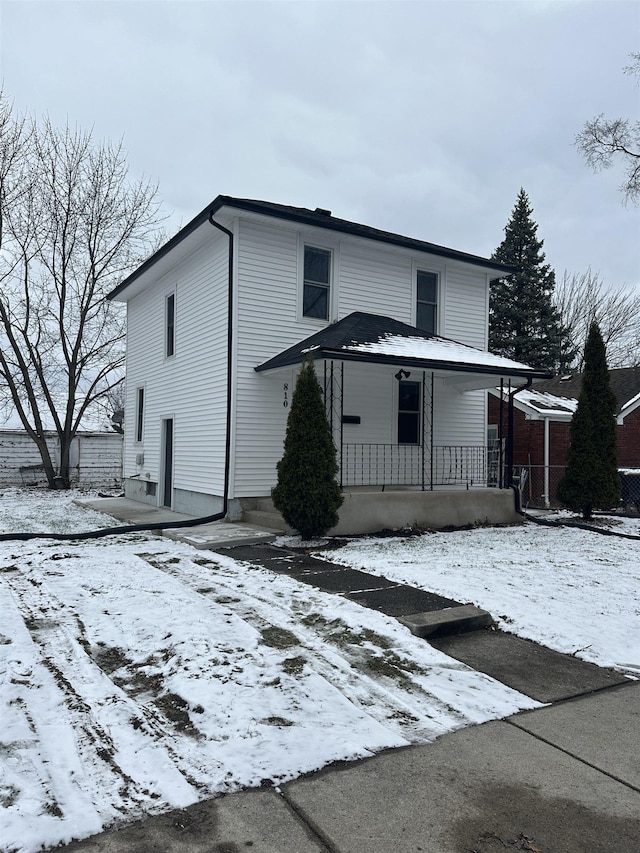 front facade featuring covered porch