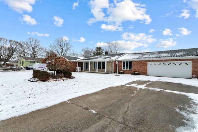 single story home with a garage