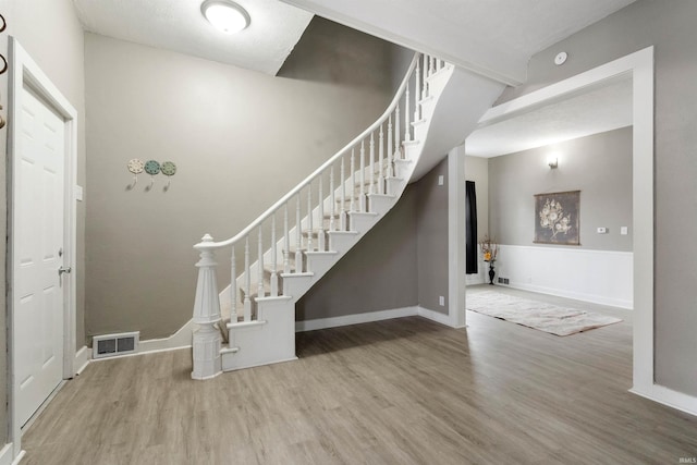 entrance foyer with wood-type flooring