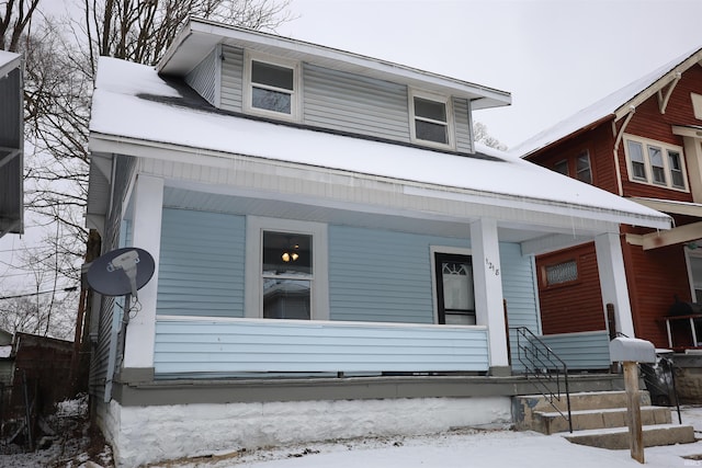 view of front of home featuring covered porch