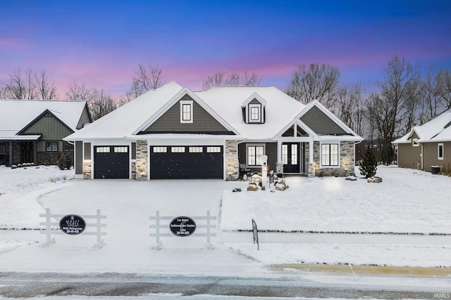 view of front of home with a garage