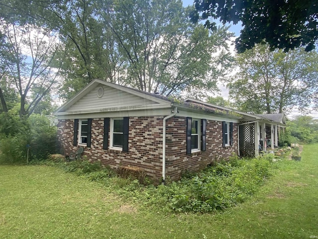 view of property exterior featuring a yard