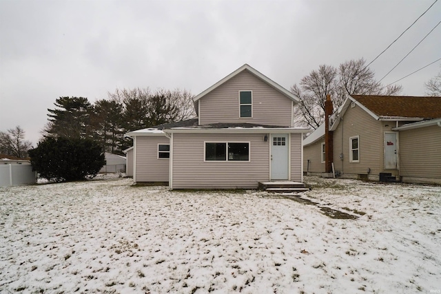 view of snow covered house