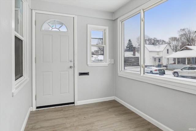 foyer entrance featuring light wood-type flooring