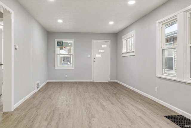 foyer entrance featuring light hardwood / wood-style floors