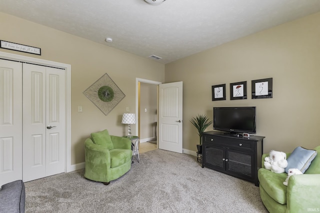 living room with light colored carpet