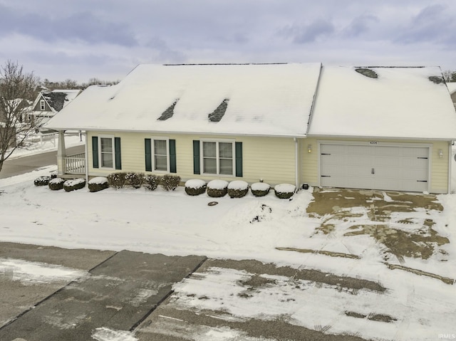 view of front of home with a garage