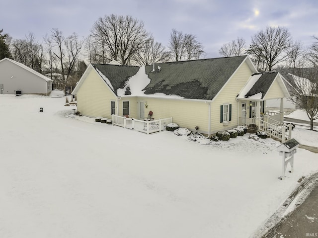 view of snow covered house