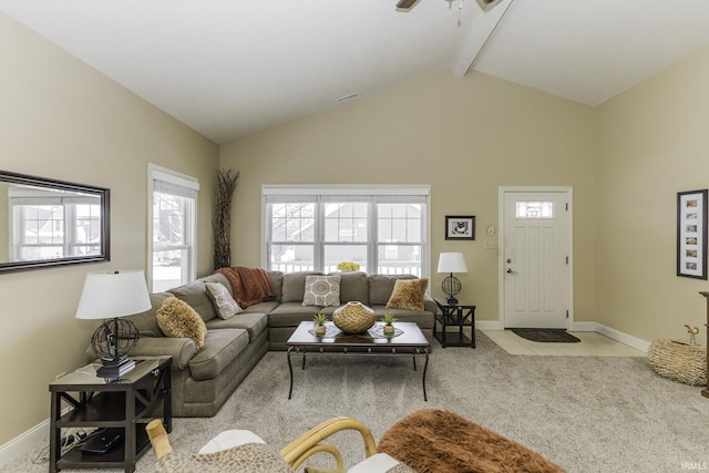 living room featuring beam ceiling, light colored carpet, and high vaulted ceiling