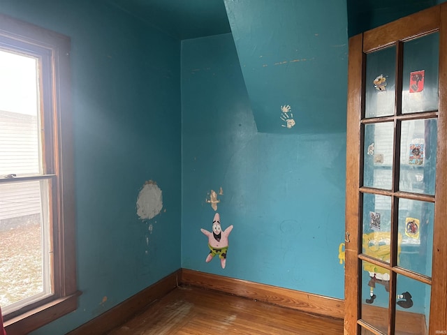 unfurnished room featuring hardwood / wood-style floors