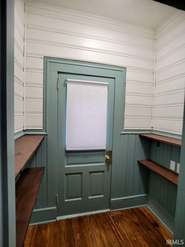 doorway featuring dark wood-type flooring