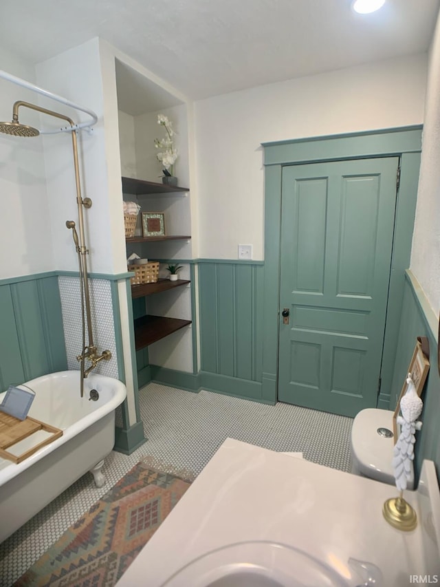 bathroom with tile patterned floors and separate shower and tub